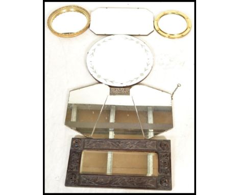 A good collection of vintage 20th mirrors to include a Regency Revival Brass Convex, framless Art Deco mirrors, oak framed et