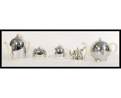 A vintage 20th Century Ever - Hot tea service to include teapot, coffee pot creamer, sugar pot together with two other associ