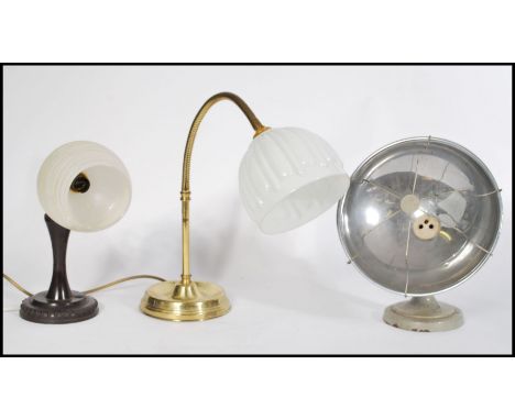 A collection of three vintage / retro 20th Century lamps to include a bakelite pedestal goose-neck desk lamp with fitted glas