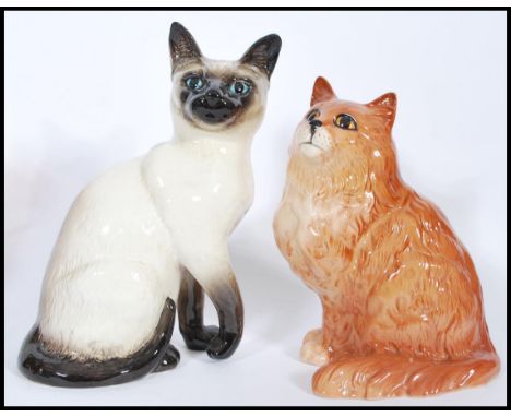 Two vintage 20th Century large Beswick ceramic cat figures to include a Beswick model fireside Siamese cat and&nbsp;large Bes