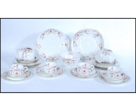 A 19th century Victorian William Alsager Adderley &amp; Co ' Spray ' Pattern china tea service comprising cups, saucers, plat