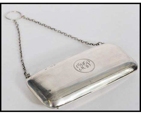 A hallmarked silver early 20th century purse having an engine turned design. Hallmarked for Birmingham 1919 makers&nbsp;Samue
