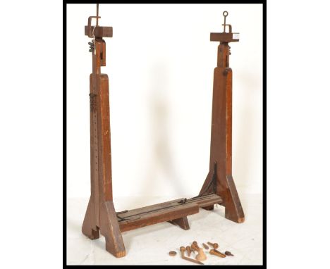 A late 19th century / early 20th century mahogany needlepoint tapestry stand raised on four block legs. 23cm-high 15cm-wide 1