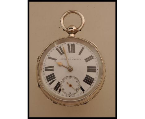 A 19th century Victorian silver hallmarked pocket watch having a fusee movement. The white enamel face having a Roman numeral