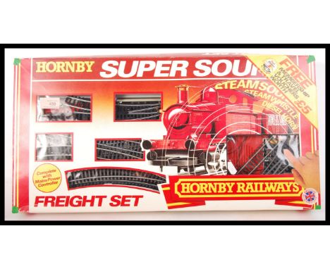 An original Hornby 00 Gauge model railway locomotive trainset R.597 Super Sound Freight Set along with extra track. Appears c