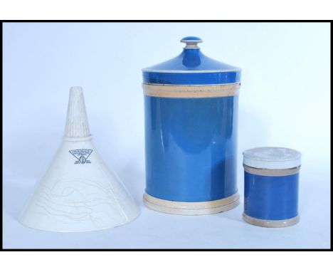 A selection of late 19th Victorian apothecary wares to include an S. Maw, Son &amp; Sons, Ltd. white ceramic funnel with a re