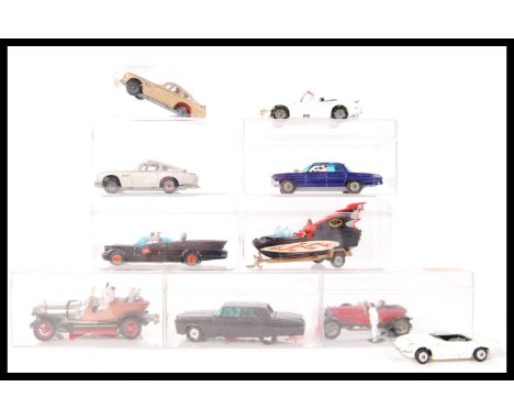 A superb collection of assorted vintage Corgi scale diecast TV and film related model vehicles to include; Batmobile ( + figu