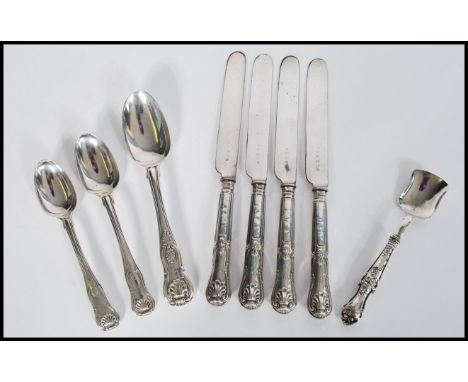 A group of 19th century matching pattern silver hallmarked Victorian and Georgian flatware to include four silver handled kni