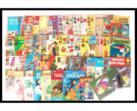 A collection of 50+ vintage assorted comic books and magazines with some examples to include; Fly Man , Super and Batman with