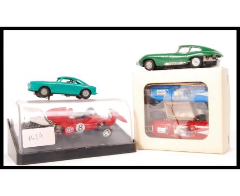 A collection slot car racing models to include; Scalextric c.026 March Ford , 2 x Marx cars within original box and 2 x loose