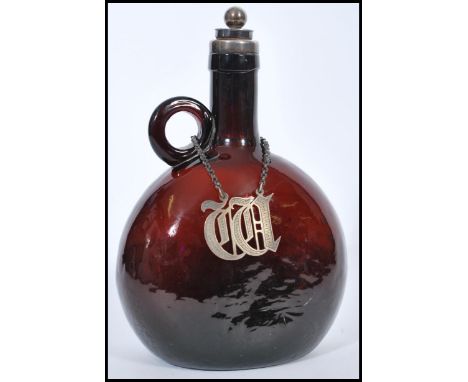 A silver hallmarked collared Dutch amber glass moon flask wine bottle converted to a de-canter, with single loop handle to th