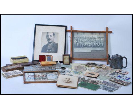 Quantity of old photographs inc an Ambrotype portrait, some Military with paperwork. Also postcards and oddments in box.