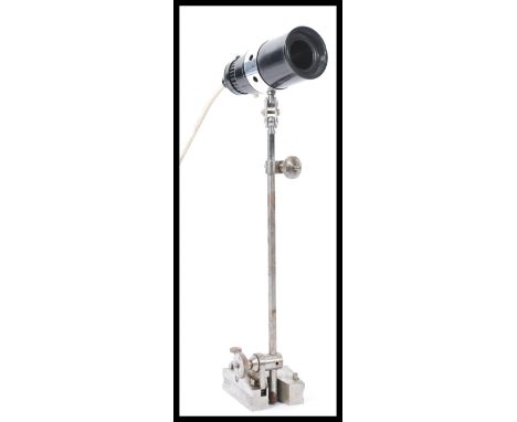 A vintage retro 20th century black bakelite inspection lamp raised on chrome adjustable block base and column. 38cm-high.&nbs