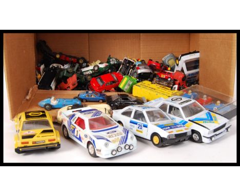 A collection of assorted scale diecast model vehicles by Corgi , Dinky , Lledo , Burago / Bburago , Matchbox and others withi