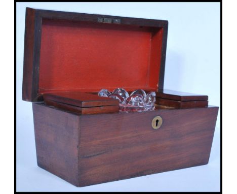 A 19th century mahogany tea caddy of sarcophagus form having a brass scutcheon to the front and a cut glass mixing bowl with 