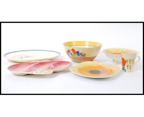 A selection of vintage 20th century retro ceramics to include a Bizarre by Clarice Cliff crocus bowl, a Wilkinson Honeyglaze 