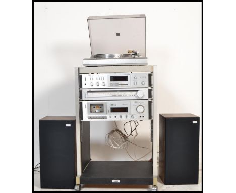 A vintage retro 20th century Akai Hi-Fi music entertainment stacking system consisting of a Direct Drive record player turnta