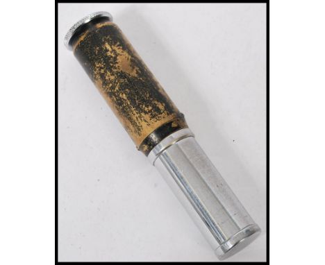 A vintage early 20th century Otis telescopic calculator. The metamorphic calculator having sliding leather case. Measures 15c