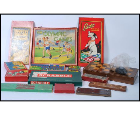 A rare 1930's " Olympic Games " Board Game with lead figures by Glevum with Ludo, Snakes &amp; Ladders, A Compendium, Knittin