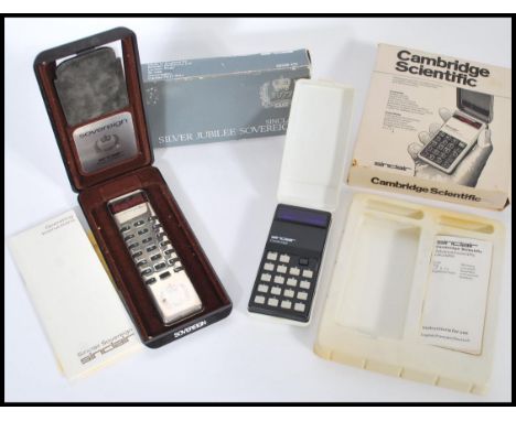 A selection of two vintage Sinclair calculators to include a Cambridge Advanced Scientific calculator in its original box wit