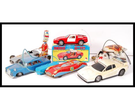 A collection of 7 x assorted vintage tin plate clockwork and battery operated toys and vehicles to include; Shinsei Benz C-11