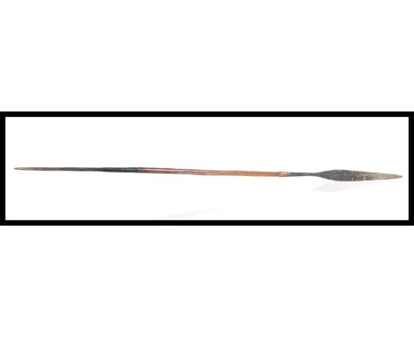 A vintage possibly African tribal Masai double ended hunting / Lion spear, the double ended spear having a wooden central sha