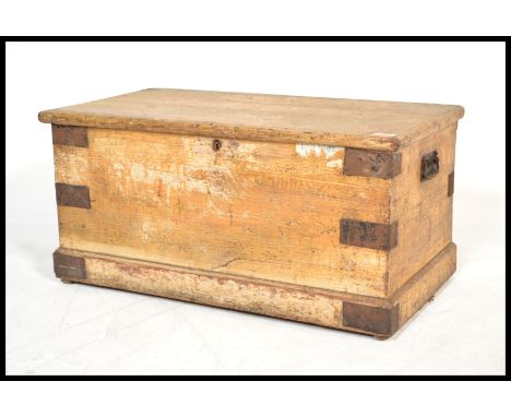 A 19th Century Victorian scrumble finished pine trunk / work-box, hinged top raised on a plinth base. Measures: 36cm high x 7