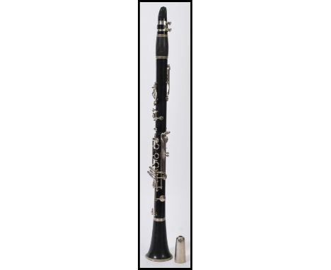 A Rene Duval cased ebonised clarinet, with nickel plated keys and mounts, stamped Rene Duval, in original leather case, Measu