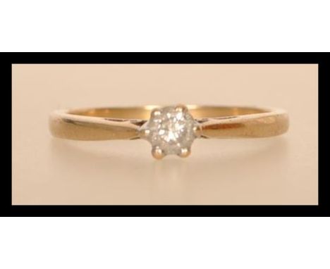 A hallmarked 9ct gold diamond solitaire ring having a central brilliant cut diamond of approx 25pts. Weighs 2.2 grams. Size R