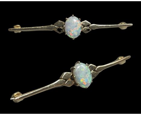 9ct fully hallmarked fancy design brooch featuring 1.5ct opal weighing 3.17 grams measuring 5cm in length