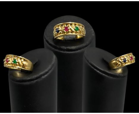 9ct yellow gold three stone ring with fancy design featuring Emerald, Ruby and Sapphire, weighing 3.24 grams, size L1/2