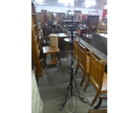A Victorian wrought iron telescopic standard lamp 