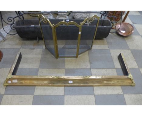 A brass fender and a spark guard 