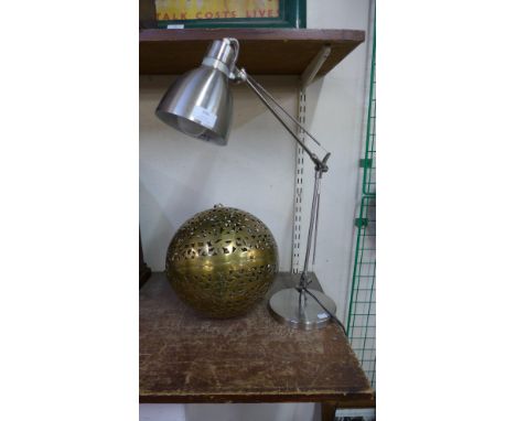 An anglepoise desk lamp and a pierced brass spherical hanging light pendant 