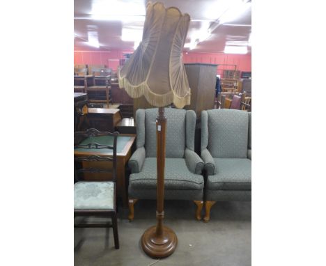 An oak octagonal standard lamp 
