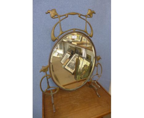 An Art Nouveau brass mirrored fire screen, a/f and a fender 