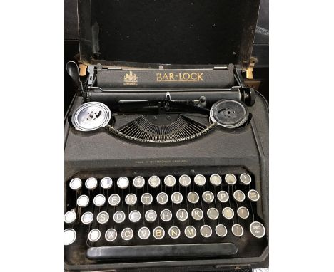 CASED PERIOD TYPEWRITER BAR-LOCK