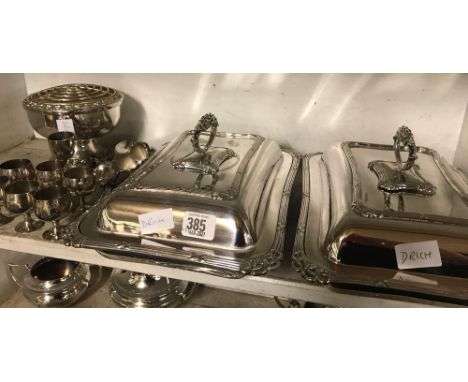 SHELF WITH PAIR OF PLATED ENTREE DISHES  PLATED EGG CUPS ETC