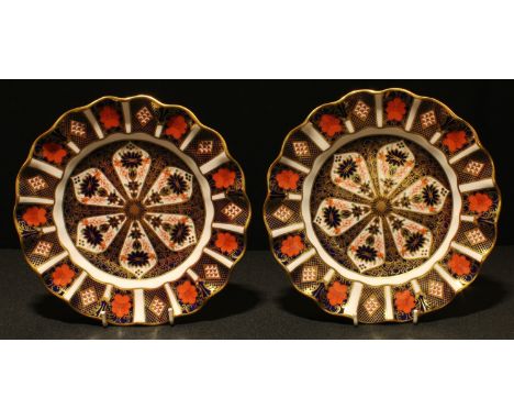 A pair of Royal Crown Derby 1128 pattern shaped circular plates, 22cm diameter, printed marks in red, first quality 