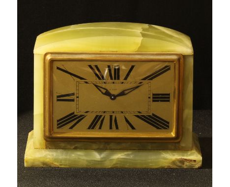 A French onyx eight day mantel clock, rectangular dial, Roman numerals, 20cm wide, 15cm high, the movement marked Bayard 
