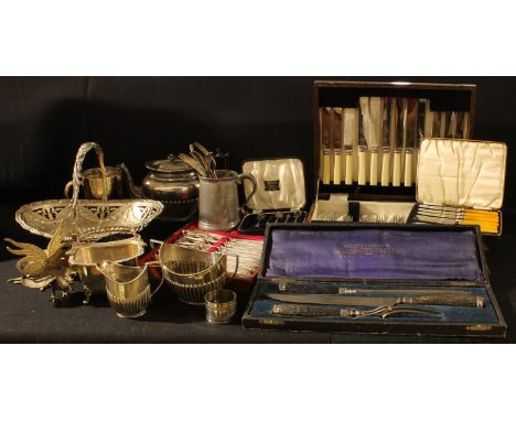 A late Victorian EPNS swing handled cake basket, embossed with garlands of bluebells; an EPNS associated three piece boat sha