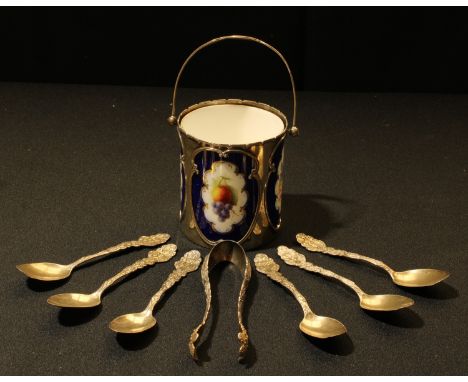 A set of six American sterling silver teaspoons, sugar bows en suite; a silver mounted Royal Worcester preserve dish, Birming