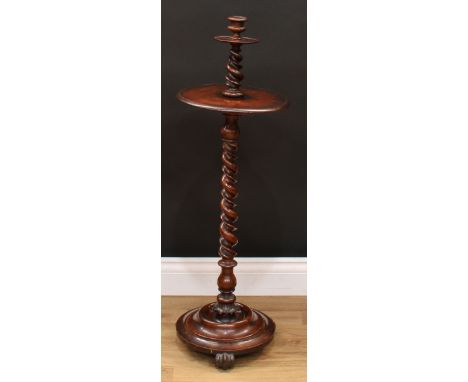 A Victorian walnut candle stand, turned urnular candlestick holder, shallow dished circular trays, spirally turned column, dr