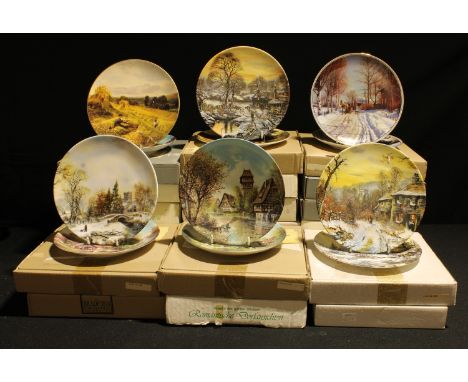 A set of Bradford Exchange colector's plates, boxed with certificates; others collector's plates, all boxed; a book, The UK E