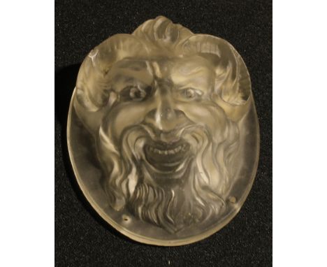 An early 20th century moulded glass wall mask, as a grinning satyr, 11cm long 