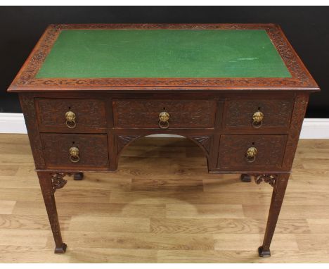 A Chinese Chippendale Revival room centre writing table, rectangular top with inset writing surface, above an arrangement of 