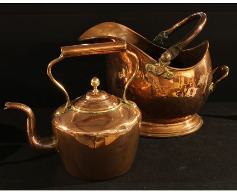 A Victorian copper kettle, acorn finial; a helmet shaped copper coal scuttle, late 19th century (2) 