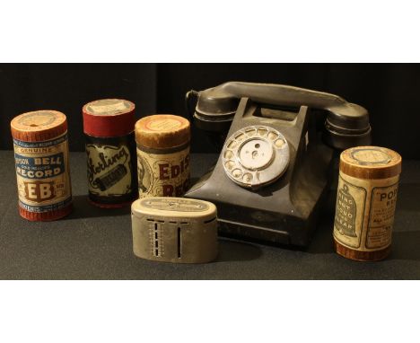 A GPO dial up telephone; four Edison Bell phonograph reels, original boxes; an Anglia Building Society savings box 