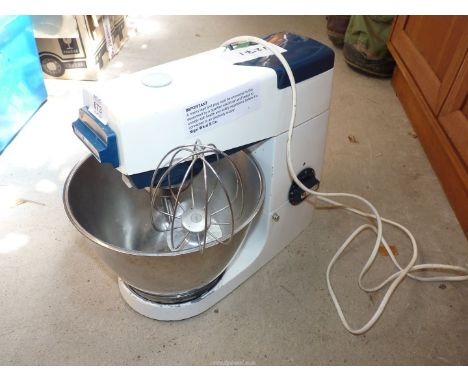 A "Kenwood" mixer with whisk and K mixer.