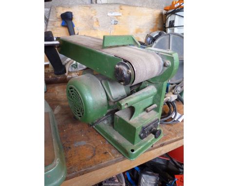 A 4" belt sander with 6" disc.